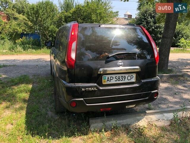 Черный Ниссан ИксТрейл, объемом двигателя 2.49 л и пробегом 343 тыс. км за 8500 $, фото 3 на Automoto.ua
