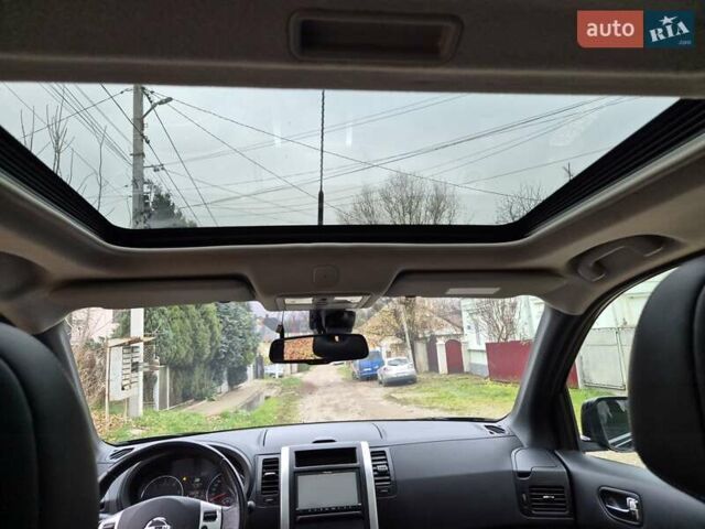 Чорний Ніссан ІксТрейл, об'ємом двигуна 2 л та пробігом 226 тис. км за 12300 $, фото 2 на Automoto.ua