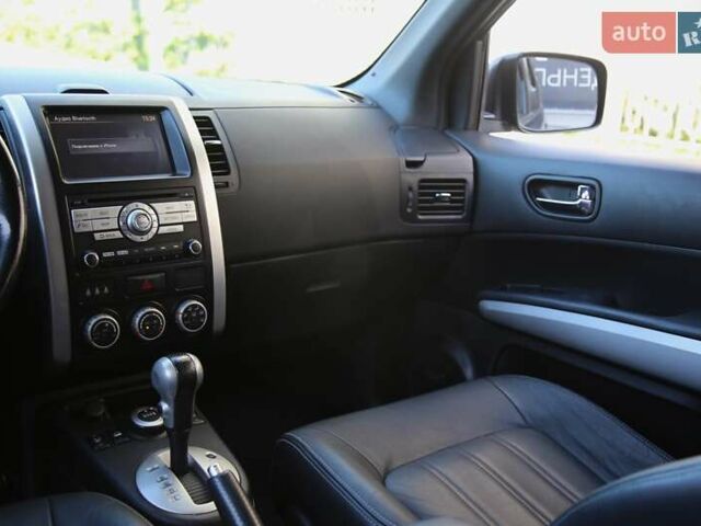 Черный Ниссан ИксТрейл, объемом двигателя 2 л и пробегом 213 тыс. км за 11999 $, фото 12 на Automoto.ua