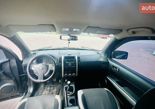 Черный Ниссан ИксТрейл, объемом двигателя 2 л и пробегом 169 тыс. км за 10500 $, фото 8 на Automoto.ua