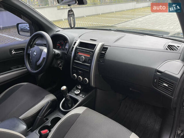 Черный Ниссан ИксТрейл, объемом двигателя 2 л и пробегом 169 тыс. км за 10900 $, фото 20 на Automoto.ua