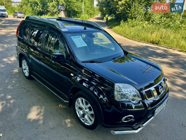 Черный Ниссан ИксТрейл, объемом двигателя 2 л и пробегом 125 тыс. км за 12300 $, фото 12 на Automoto.ua