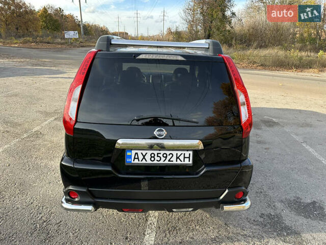 Чорний Ніссан ІксТрейл, об'ємом двигуна 2 л та пробігом 125 тис. км за 12999 $, фото 5 на Automoto.ua