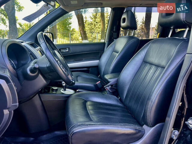 Черный Ниссан ИксТрейл, объемом двигателя 2 л и пробегом 125 тыс. км за 12300 $, фото 30 на Automoto.ua