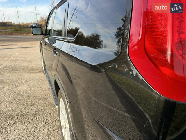 Чорний Ніссан ІксТрейл, об'ємом двигуна 2 л та пробігом 125 тис. км за 12999 $, фото 11 на Automoto.ua