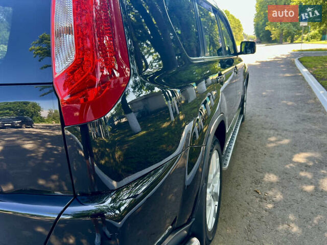 Черный Ниссан ИксТрейл, объемом двигателя 2 л и пробегом 125 тыс. км за 12300 $, фото 17 на Automoto.ua