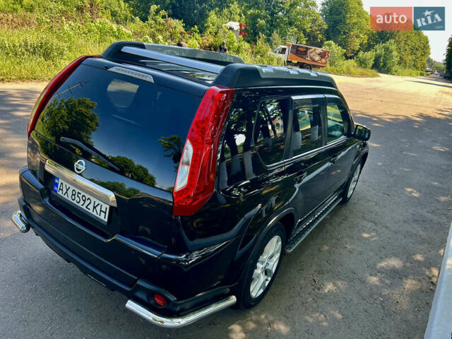 Черный Ниссан ИксТрейл, объемом двигателя 2 л и пробегом 125 тыс. км за 12300 $, фото 15 на Automoto.ua