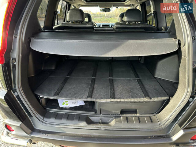 Чорний Ніссан ІксТрейл, об'ємом двигуна 2 л та пробігом 125 тис. км за 12999 $, фото 16 на Automoto.ua