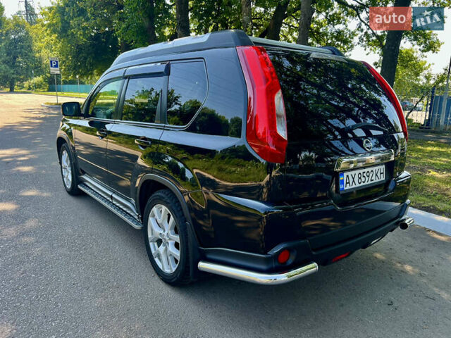 Черный Ниссан ИксТрейл, объемом двигателя 2 л и пробегом 125 тыс. км за 12300 $, фото 8 на Automoto.ua