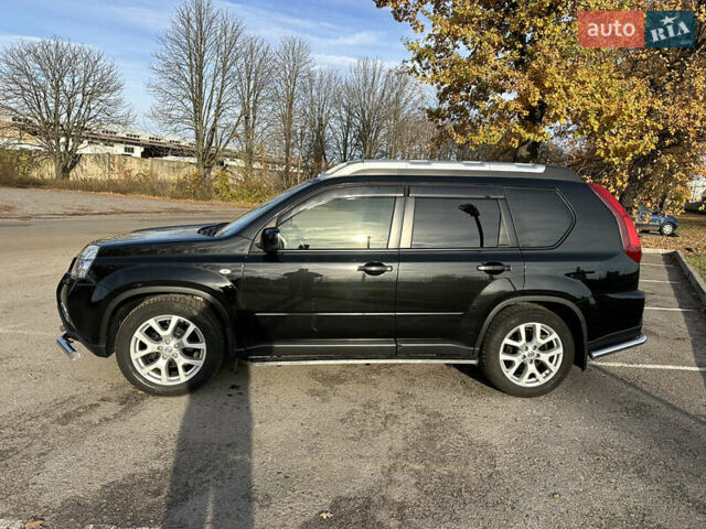 Чорний Ніссан ІксТрейл, об'ємом двигуна 2 л та пробігом 125 тис. км за 12999 $, фото 3 на Automoto.ua