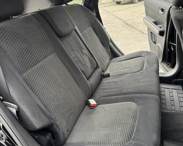 Черный Ниссан ИксТрейл, объемом двигателя 2 л и пробегом 11 тыс. км за 18500 $, фото 52 на Automoto.ua