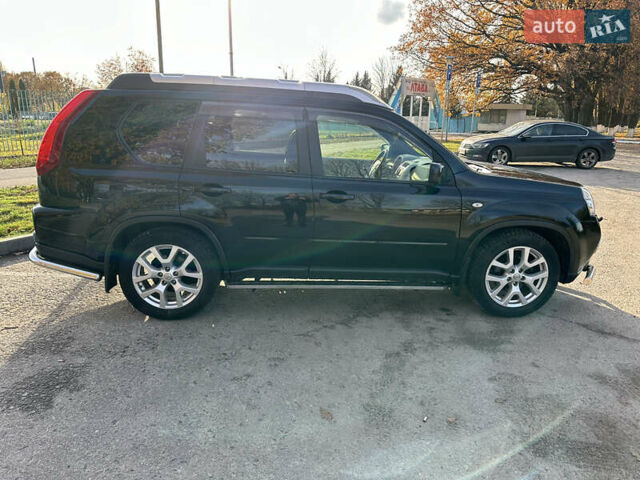 Чорний Ніссан ІксТрейл, об'ємом двигуна 2 л та пробігом 125 тис. км за 12999 $, фото 7 на Automoto.ua