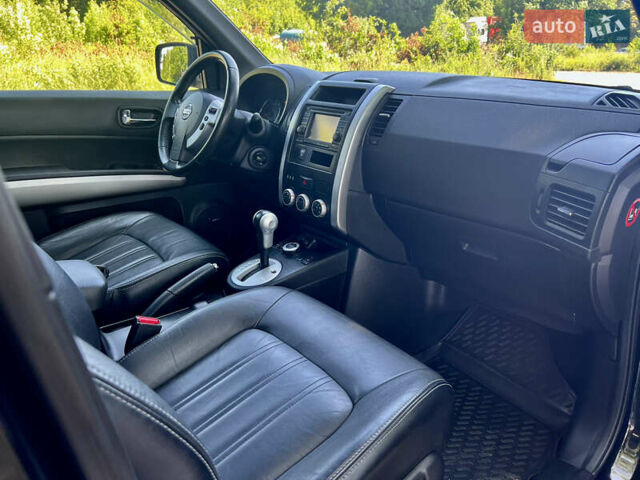 Черный Ниссан ИксТрейл, объемом двигателя 2 л и пробегом 125 тыс. км за 12300 $, фото 46 на Automoto.ua