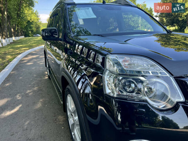 Черный Ниссан ИксТрейл, объемом двигателя 2 л и пробегом 125 тыс. км за 12300 $, фото 21 на Automoto.ua