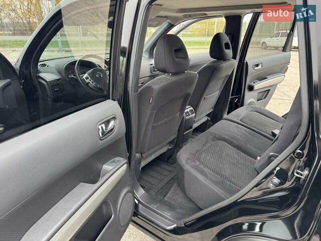 Черный Ниссан ИксТрейл, объемом двигателя 2 л и пробегом 11 тыс. км за 18500 $, фото 34 на Automoto.ua