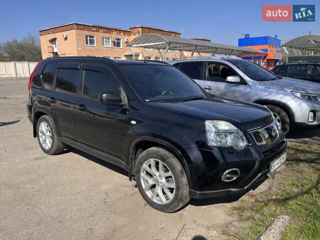 Черный Ниссан ИксТрейл, объемом двигателя 2.5 л и пробегом 172 тыс. км за 12200 $, фото 3 на Automoto.ua