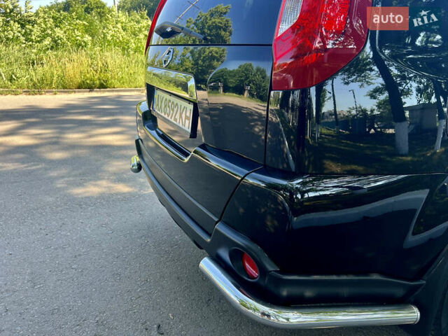 Черный Ниссан ИксТрейл, объемом двигателя 2 л и пробегом 125 тыс. км за 12300 $, фото 16 на Automoto.ua