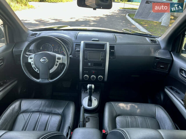 Черный Ниссан ИксТрейл, объемом двигателя 2 л и пробегом 125 тыс. км за 12300 $, фото 43 на Automoto.ua