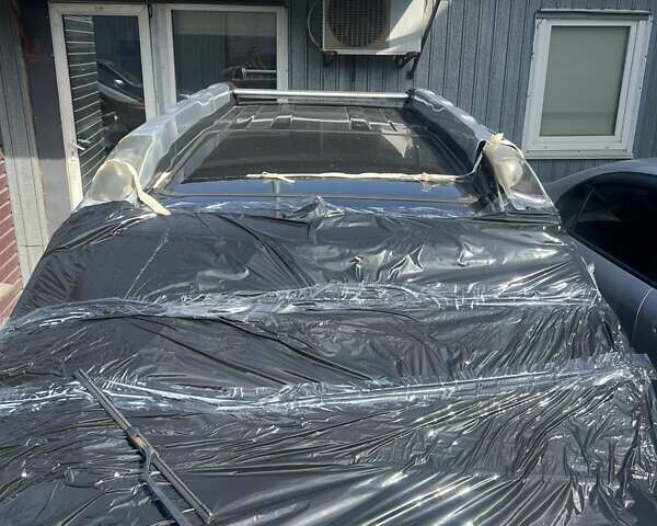 Черный Ниссан ИксТрейл, объемом двигателя 2 л и пробегом 170 тыс. км за 3900 $, фото 4 на Automoto.ua