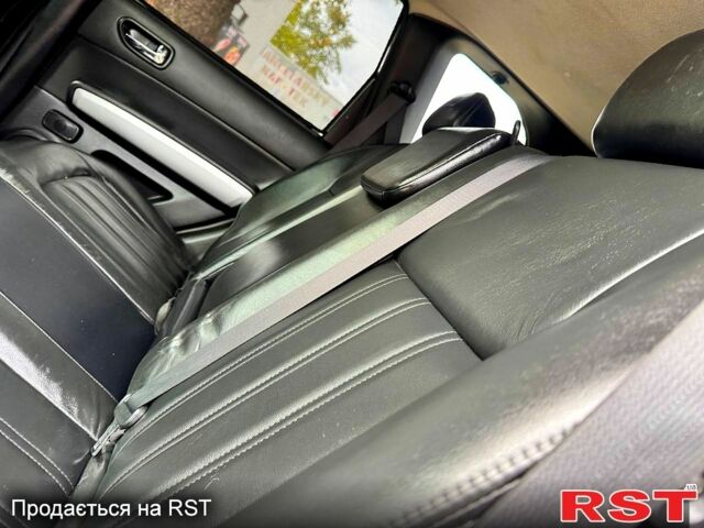 Черный Ниссан ИксТрейл, объемом двигателя 2.5 л и пробегом 159 тыс. км за 11780 $, фото 10 на Automoto.ua