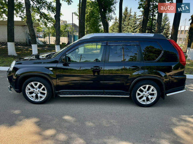 Черный Ниссан ИксТрейл, объемом двигателя 2 л и пробегом 125 тыс. км за 12300 $, фото 7 на Automoto.ua