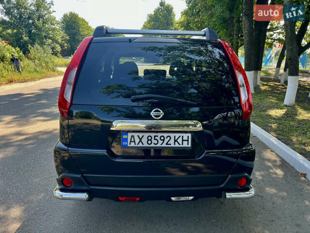 Черный Ниссан ИксТрейл, объемом двигателя 2 л и пробегом 125 тыс. км за 12300 $, фото 9 на Automoto.ua