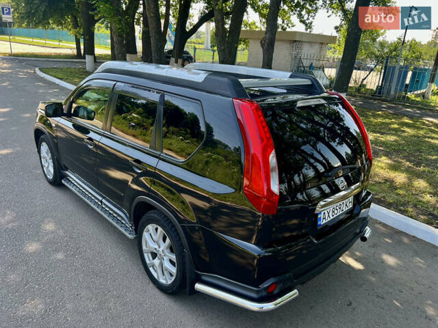 Черный Ниссан ИксТрейл, объемом двигателя 2 л и пробегом 125 тыс. км за 12300 $, фото 14 на Automoto.ua