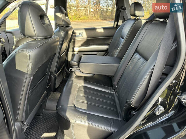 Чорний Ніссан ІксТрейл, об'ємом двигуна 2 л та пробігом 125 тис. км за 12999 $, фото 17 на Automoto.ua