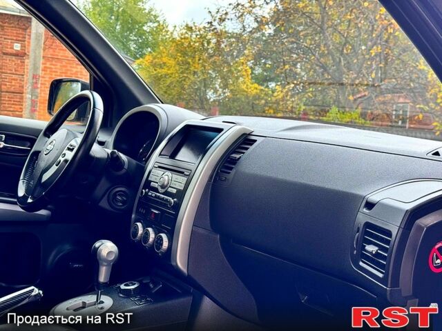 Черный Ниссан ИксТрейл, объемом двигателя 2.5 л и пробегом 159 тыс. км за 11780 $, фото 6 на Automoto.ua