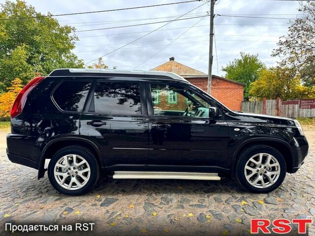 Черный Ниссан ИксТрейл, объемом двигателя 2.5 л и пробегом 159 тыс. км за 11780 $, фото 2 на Automoto.ua