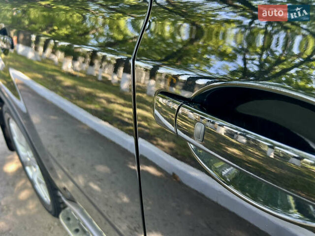 Черный Ниссан ИксТрейл, объемом двигателя 2 л и пробегом 125 тыс. км за 12300 $, фото 23 на Automoto.ua