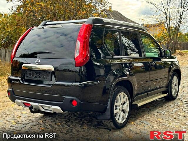 Черный Ниссан ИксТрейл, объемом двигателя 2.5 л и пробегом 159 тыс. км за 11780 $, фото 3 на Automoto.ua
