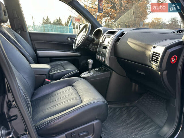 Чорний Ніссан ІксТрейл, об'ємом двигуна 2 л та пробігом 125 тис. км за 12999 $, фото 20 на Automoto.ua