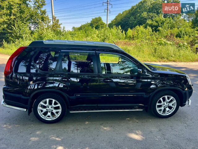 Черный Ниссан ИксТрейл, объемом двигателя 2 л и пробегом 125 тыс. км за 12300 $, фото 11 на Automoto.ua