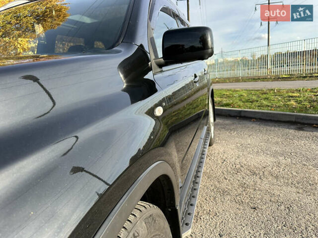 Чорний Ніссан ІксТрейл, об'ємом двигуна 2 л та пробігом 125 тис. км за 12999 $, фото 10 на Automoto.ua