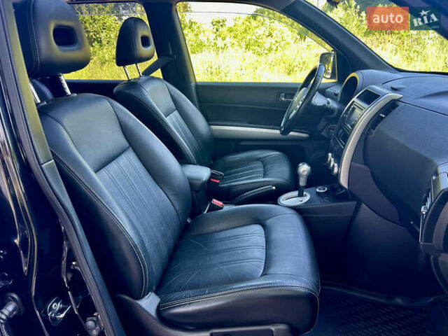 Черный Ниссан ИксТрейл, объемом двигателя 2 л и пробегом 125 тыс. км за 12300 $, фото 44 на Automoto.ua