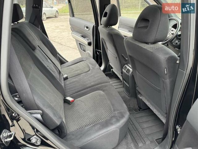 Черный Ниссан ИксТрейл, объемом двигателя 2 л и пробегом 11 тыс. км за 18500 $, фото 53 на Automoto.ua