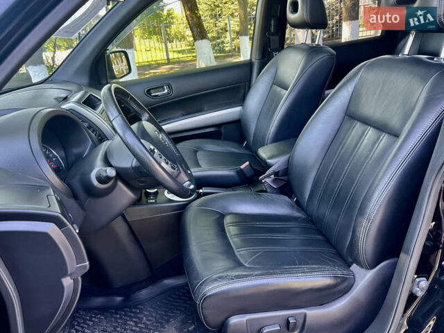 Черный Ниссан ИксТрейл, объемом двигателя 2 л и пробегом 125 тыс. км за 12300 $, фото 31 на Automoto.ua