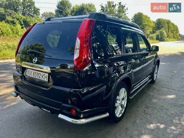 Черный Ниссан ИксТрейл, объемом двигателя 2 л и пробегом 125 тыс. км за 12300 $, фото 10 на Automoto.ua