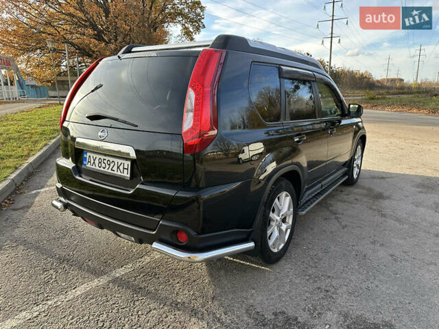 Чорний Ніссан ІксТрейл, об'ємом двигуна 2 л та пробігом 125 тис. км за 12999 $, фото 6 на Automoto.ua