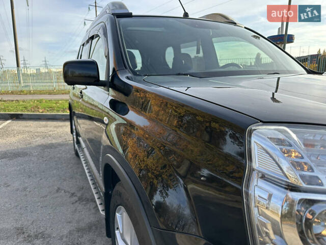 Чорний Ніссан ІксТрейл, об'ємом двигуна 2 л та пробігом 125 тис. км за 12999 $, фото 13 на Automoto.ua