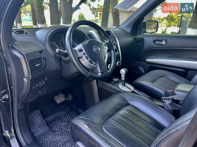 Черный Ниссан ИксТрейл, объемом двигателя 2 л и пробегом 125 тыс. км за 12300 $, фото 32 на Automoto.ua