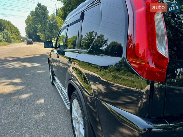 Черный Ниссан ИксТрейл, объемом двигателя 2 л и пробегом 125 тыс. км за 12300 $, фото 18 на Automoto.ua