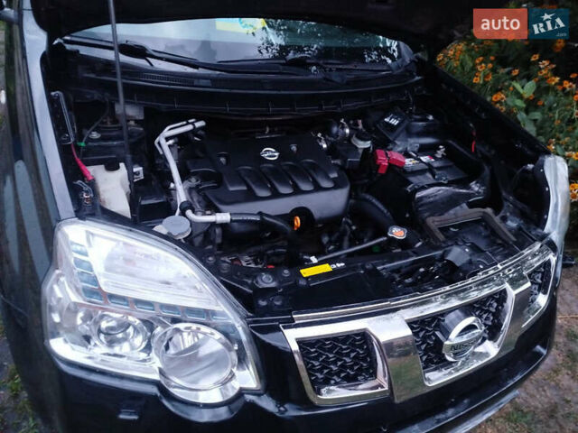Чорний Ніссан ІксТрейл, об'ємом двигуна 2 л та пробігом 190 тис. км за 11700 $, фото 7 на Automoto.ua