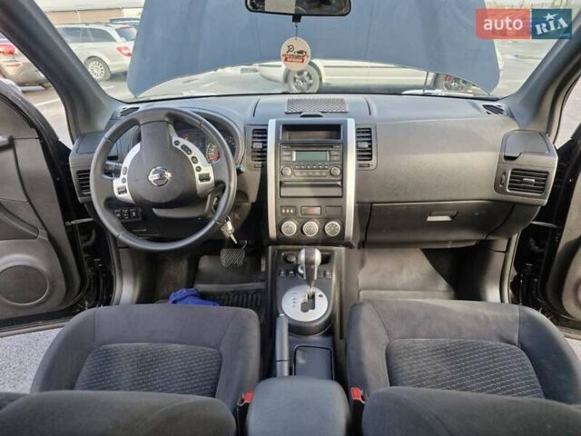 Черный Ниссан ИксТрейл, объемом двигателя 2 л и пробегом 114 тыс. км за 14000 $, фото 14 на Automoto.ua