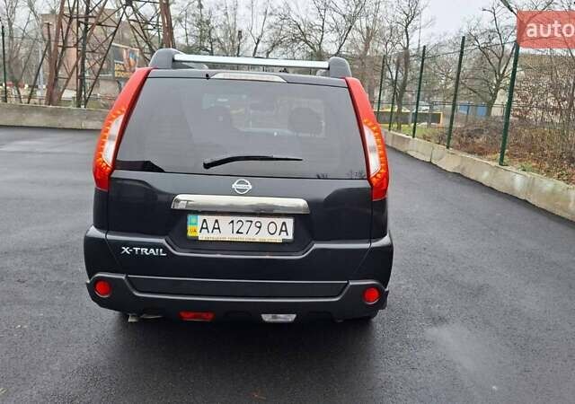 Черный Ниссан ИксТрейл, объемом двигателя 2 л и пробегом 213 тыс. км за 11950 $, фото 8 на Automoto.ua