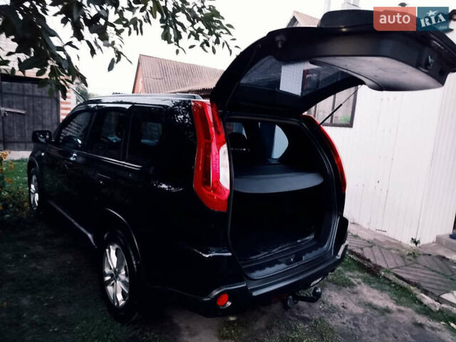 Чорний Ніссан ІксТрейл, об'ємом двигуна 2 л та пробігом 190 тис. км за 11700 $, фото 3 на Automoto.ua
