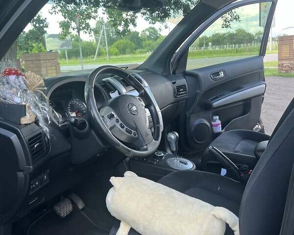 Ниссан ИксТрейл 2013 в Конотопе на Automoto.ua Черный Ниссан ИксТрейл, объемом двигателя 2.49 л и пробегом 225 тыс. км за 12500 $, фото 2 на Automoto.ua
