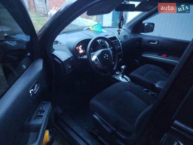 Чорний Ніссан ІксТрейл, об'ємом двигуна 2 л та пробігом 190 тис. км за 11700 $, фото 10 на Automoto.ua