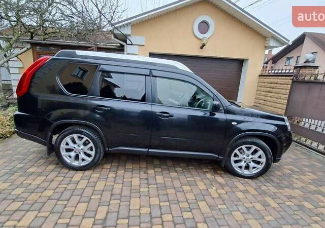 Черный Ниссан ИксТрейл, объемом двигателя 2 л и пробегом 213 тыс. км за 11950 $, фото 13 на Automoto.ua